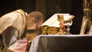 web3-eucharist-priest-altair-church-thoom-shutterstock