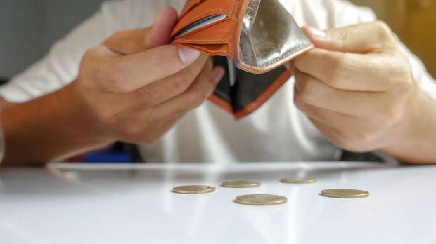 WEB3-MONEY-GIVE-WALET-MAN-COINS-Shutterstock