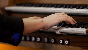 web3-hands-woman-organist-organ-shutterstock