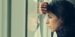 WOMAN AT THE WINDOW,