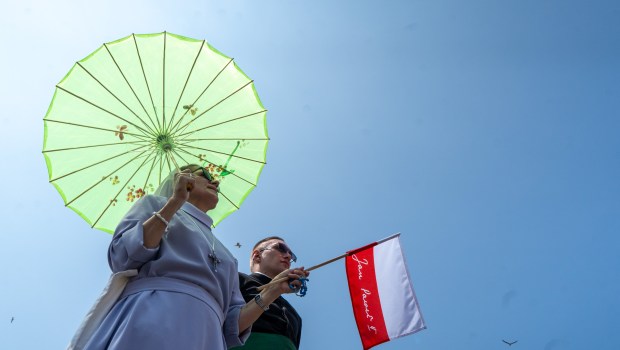 Polish Nun and Priest during Pope Francis Angelus prayer.
